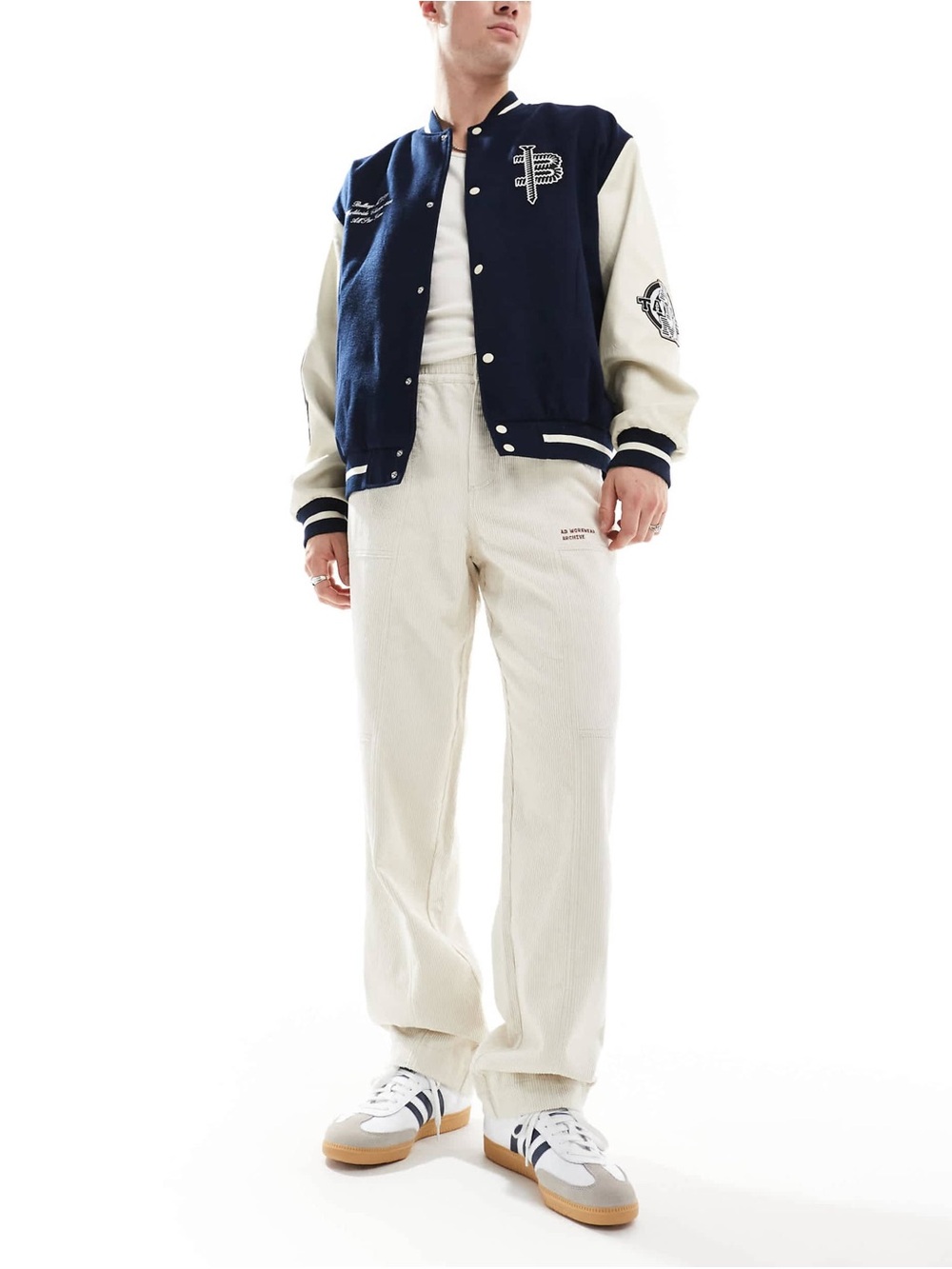 ASOS DESIGN baggy corduroy pants with embroidered patch in stone